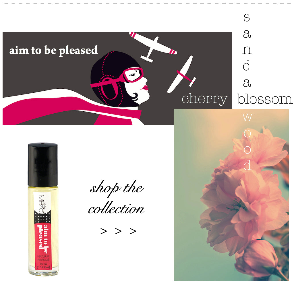 Aim To Be Pleased original artwork of female pilot and planes.  Sandalwood + Cherry Blossom.  Aim To Be Pleased Perfume.  Click to shop the collection.